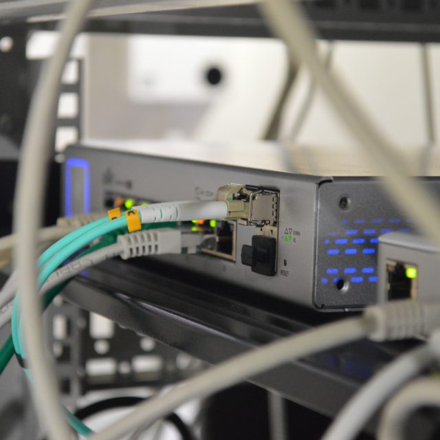 Professionally set up and managed server system with network cords and cables